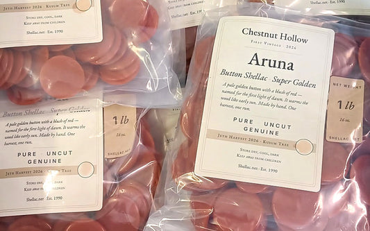 One-pound bags of Chestnut Hollow Aruna Super Golden button shellac, first vintage 2026