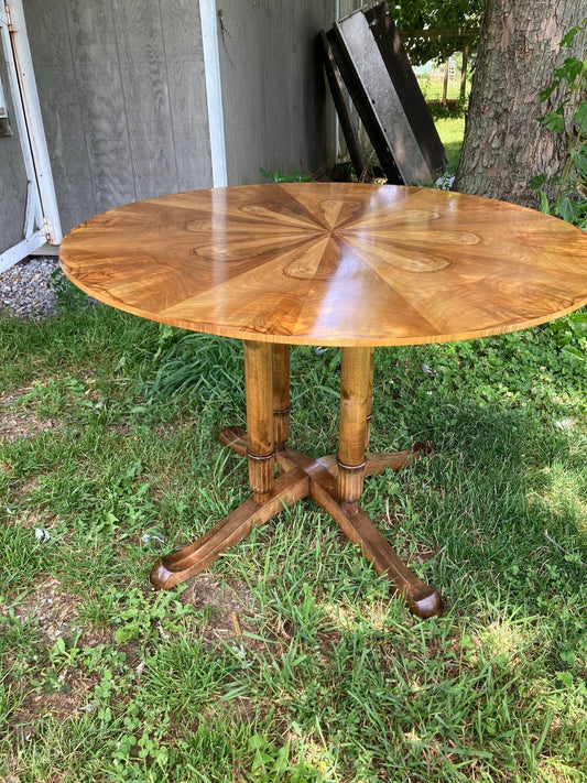 A sunburst-veneered tilt-top table restored by Ben Parry, Oxford, Pennsylvania