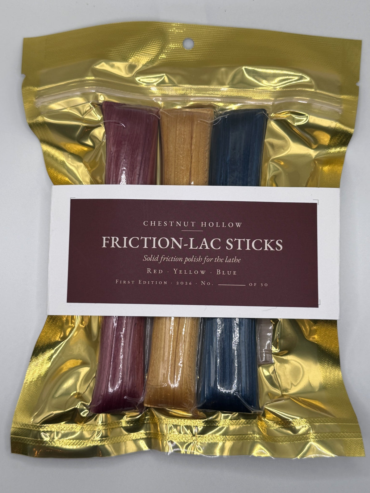 Friction-Lac Sticks First Edition Set, boxed, red yellow blue sticks visible through window