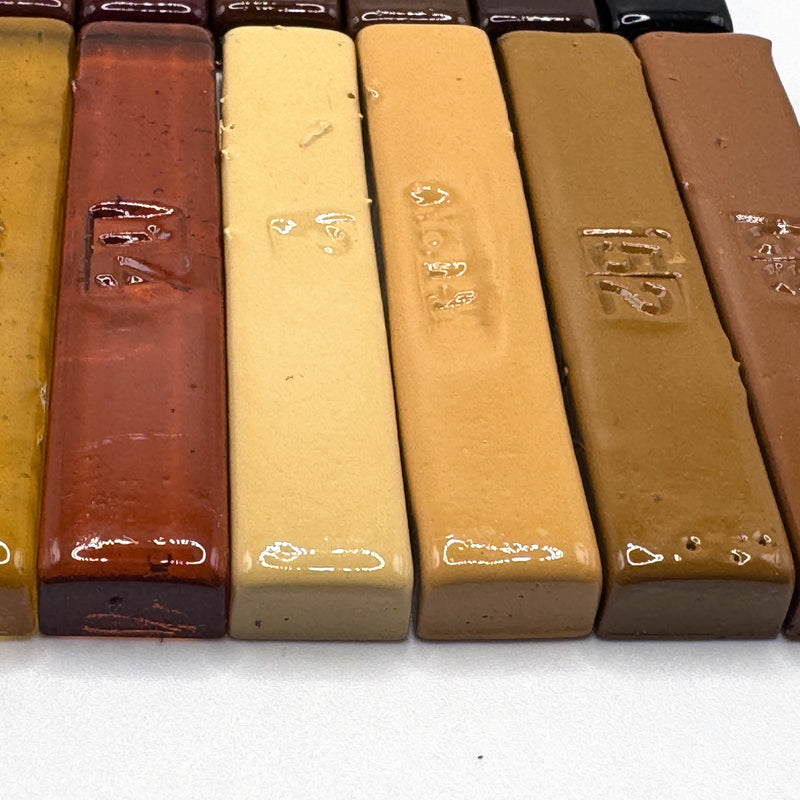 Translucent ambers beside French maple and caramel