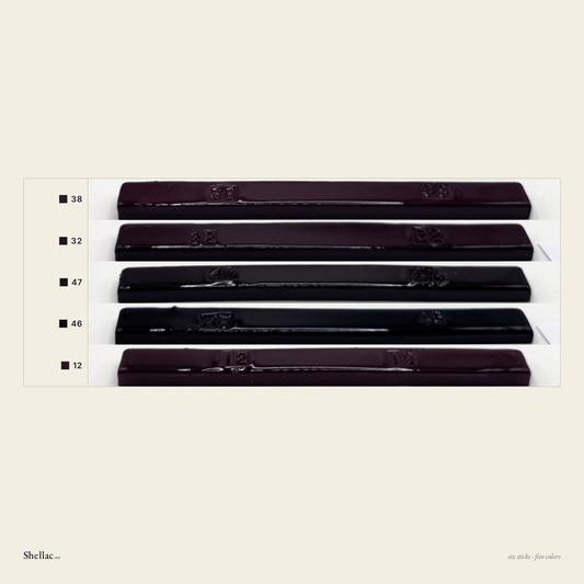 The Mahogany & Rosewood Six color chart — five Merit burn-in stick colors, each labeled with its number, dark red mahogany through rosewood to dark transparent